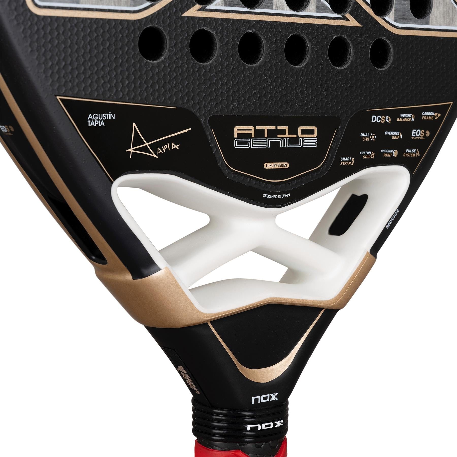 Close-up of the black NOX AT10 Genius 18K Alum By Agustín Tapia 2026 Padel Racket, showcasing gold accents, signature details, a unique triangular cutout, and an advanced Dual Spin surface for superior control and spin.