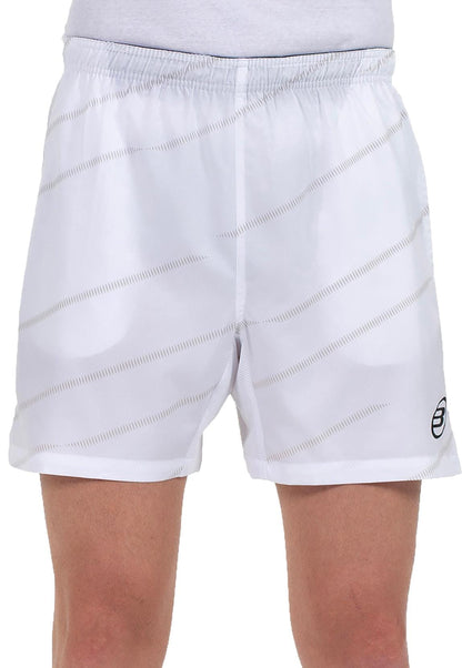 A person wearing Bullpadel Cabanas Mens Padel Shorts - White, featuring light diagonal stripes, an elastic waistband, and Quickerdry technology for comfort. Shown from waist to mid-thigh. Brand: Bullpadel.