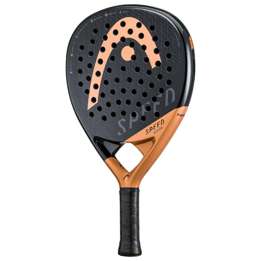 The HEAD Speed Motion 2023 Padel Racket, available in a stylish black and copper design, features a perforated surface with the word "SPEED" prominently displayed. Enhanced with Auxetic technology, its handle is wrapped in black grip tape for excellent control.