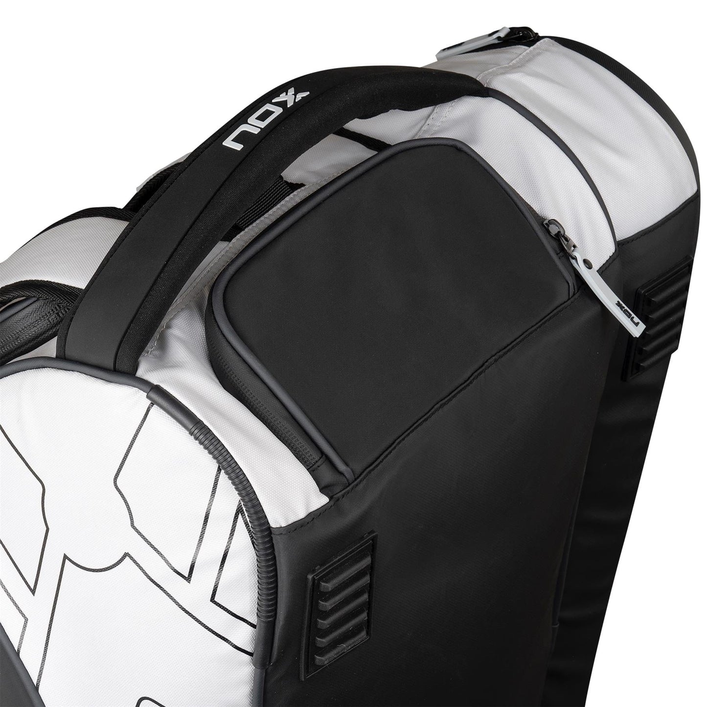 Close-up of the NOX Luxury Master Series Padel Racket Bag in black and white, featuring a zippered pocket, padded handle, and "NOX" logo on the strap—an ideal pick for fans of premium NOX gear.