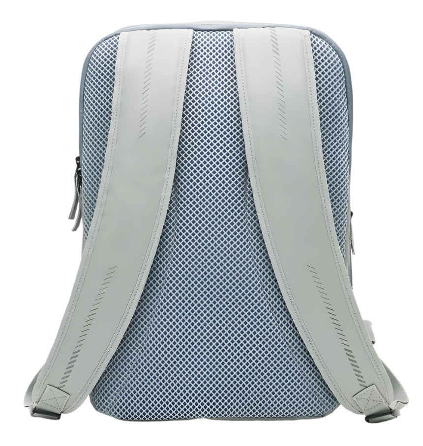 The image displays the back of the Kanso Intuko Padel 23L Backpack in Grey, featuring breathable mesh padding, adjustable shoulder straps with stitching details, and a subtle reflective print for improved visibility.