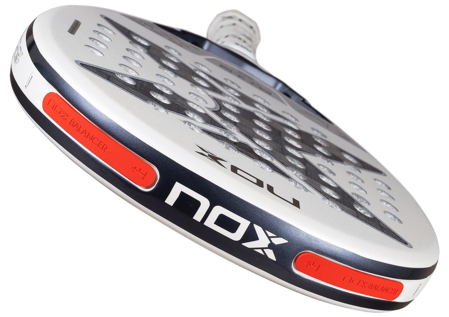 Close-up of the NOX AT10 Genius 12K Alum Extrem Lite By Agustín Tapia 2026 Padel Racket, showing its perforated surface, NOX branding, red Weight Balance system inserts on the frame, and a partially visible handle.