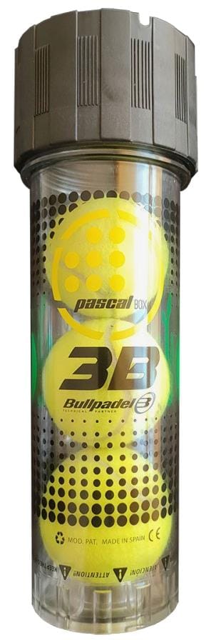 A transparent tube with a gray lid holds three yellow padel balls. The black and yellow label shows "Bullpadel Pascal Padel Ball Pressuriser - 3 Ball Tube," marking it as a premium ball pressuriser made in Spain.