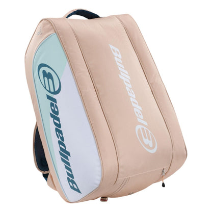 The Bullpadel Elite 25 Padel Racket Bag in pink, approved by Bullpadel athlete Gemma Triay, displays the logo on the front and includes thermo-lined compartments with a secure zipper closure.