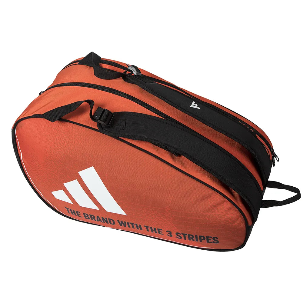 The adidas Control 3.4 Padel Racket Bag in orange features black straps, a modern graphic design with the white adidas logo and "THE BRAND WITH THE 3 STRIPES" on the side, plus a dedicated racket compartment for convenience.
