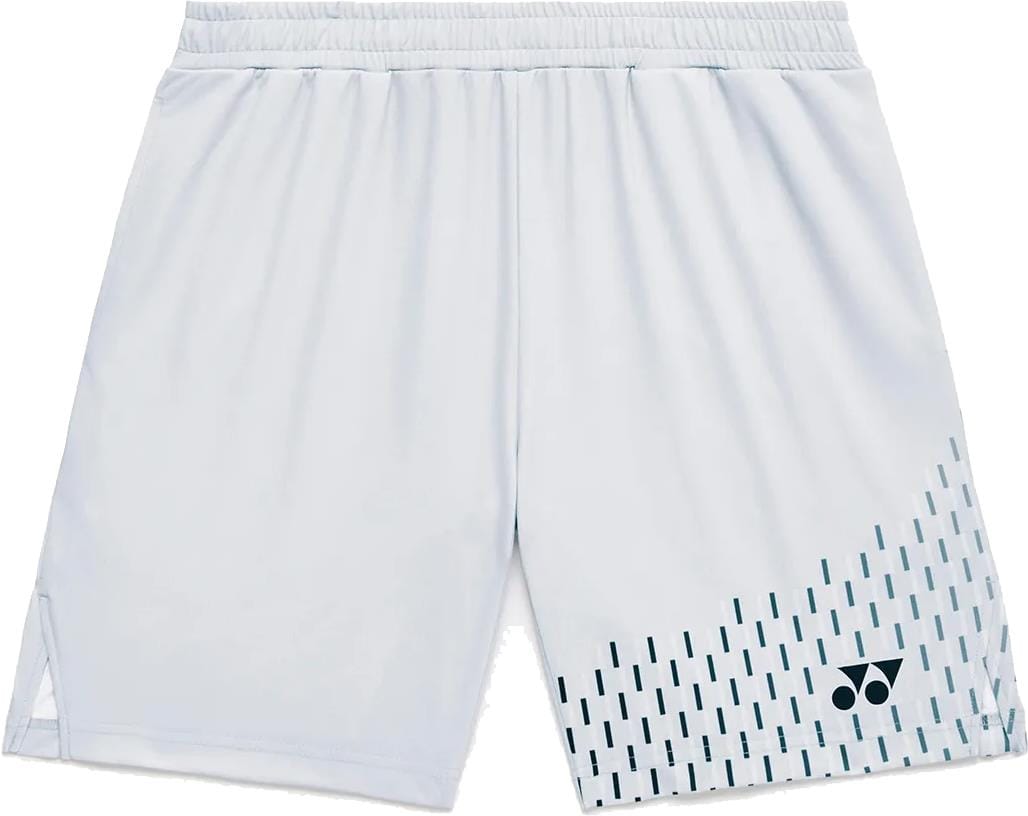 The Yonex 15241EX Knit Men's Padel Shorts in silver grey feature an elastic waistband, subtle vertical stripes on one leg, and a black logo near the hem. These moisture-wicking Yonex shorts are ideal for active days.