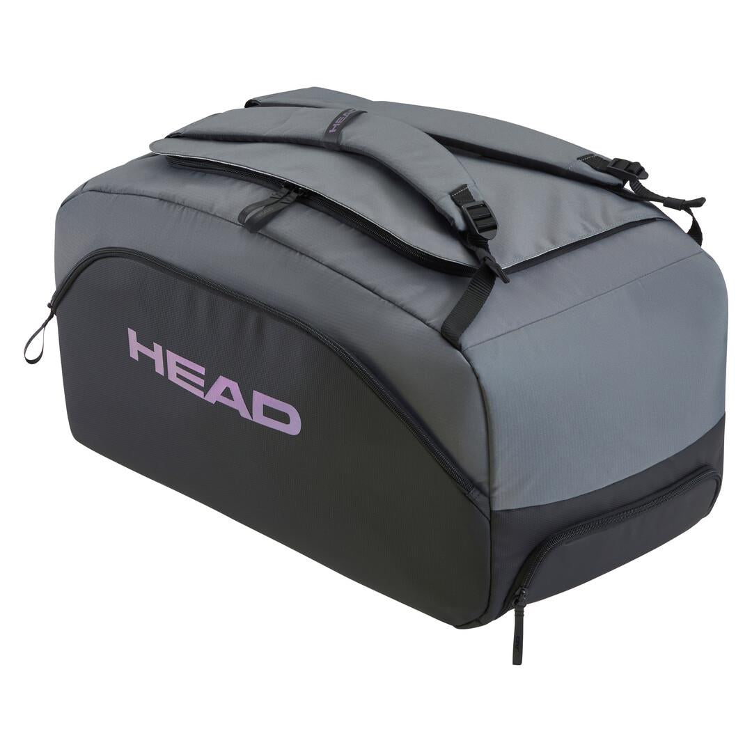 The HEAD Pro X Padel Duffle Bag in Black/Dark Grey is a sustainable sports bag crafted from recycled PET bottles featuring multiple compartments, a zippered pocket, adjustable shoulder straps, and "HEAD" branding on the side.