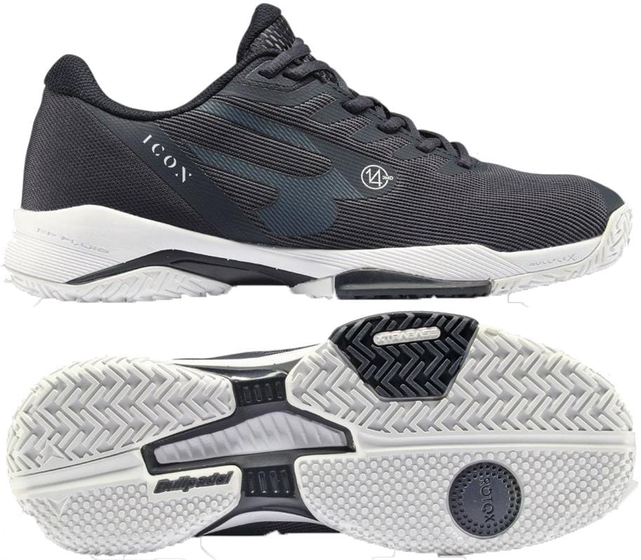 A pair of navy Bullpadel Icon 26V men's padel shoes with white soles, shown from the side and bottom. These lightweight court shoes feature a textured surface, lace-up front, and “ICON” branding on the side.