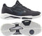 A pair of navy Bullpadel Icon 26V men's padel shoes with white soles, shown from the side and bottom. These lightweight court shoes feature a textured surface, lace-up front, and “ICON” branding on the side.