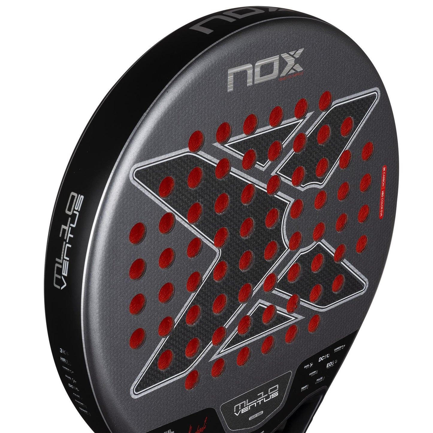 Close-up of the NOX ML10 Ventus Control 3K By Miguel Lamperti 2026 padel racket, featuring a sleek black and gray design with a silver "X," red circular holes, and NOX branding—ideal for players who want top control.