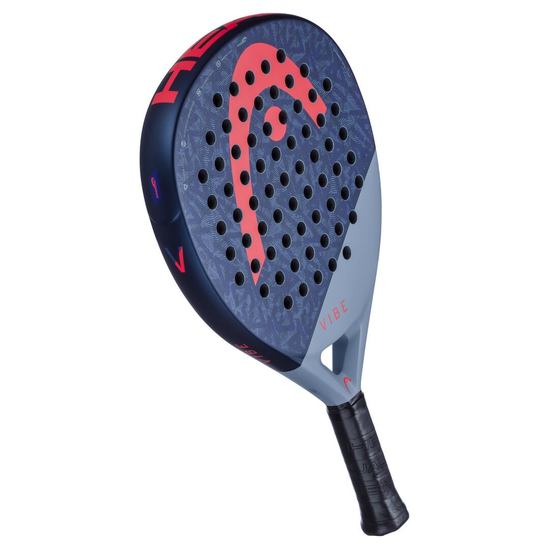 The HEAD Vibe 2025 Padel Racket by HEAD features a blue and black color scheme with a red logo and "VIBE" in red on the fiberglass surface. Multiple round holes ensure precision, power foam boosts hits, and a black grip tape handle offers optimum control.