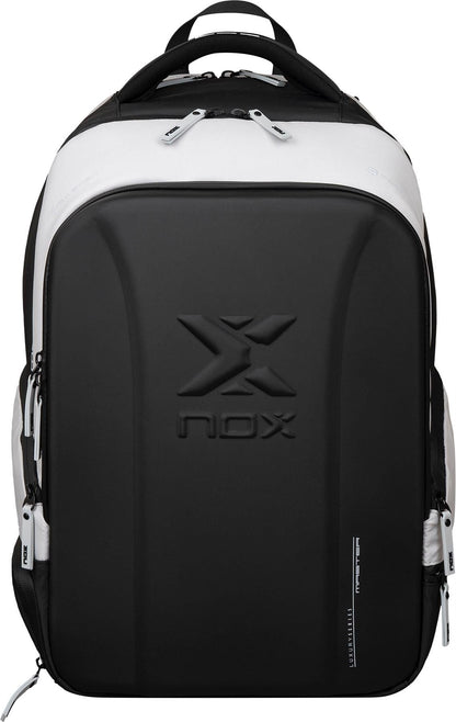 The NOX Luxury Master Series Padel Backpack in black/white features a hard-shell front, multiple compartments, and a top handle—ideal for padel enthusiasts. Brand: NOX. Seen from the front against a white background.