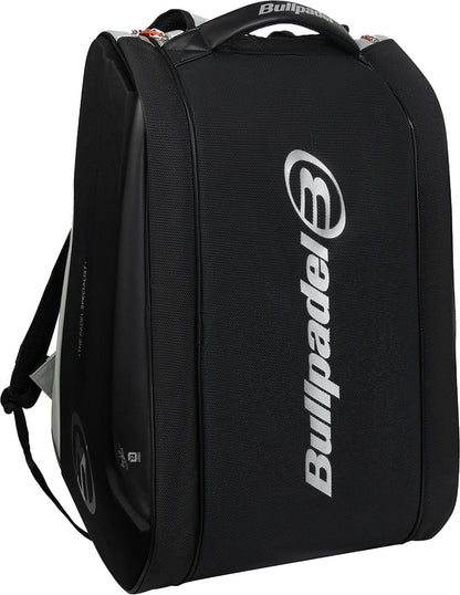 The Bullpadel BPP26013 Hack 2026 Padel Racket Bag in grey features a hard shell, sturdy top handle, zippered compartments, thermal racket sections for protection, and a bold white Bullpadel logo on the front.