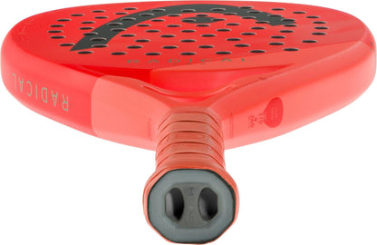 Close-up view of the HEAD Radical Pro 2026 Padel Racket in orange and green by HEAD, showing its handle in the foreground and perforated face in the background.