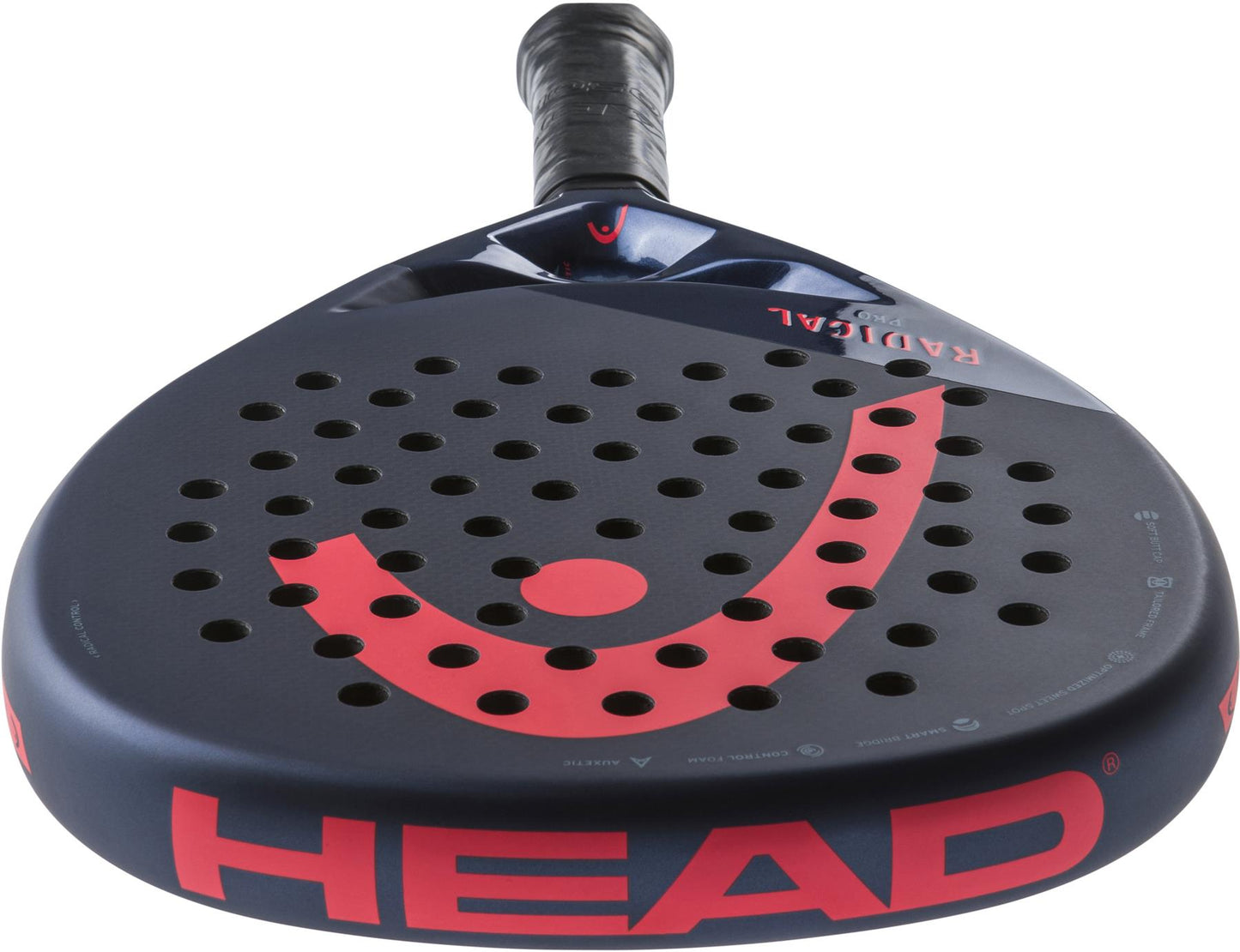 A close-up of the HEAD Radical Pro 2024 Padel Racket - Navy reveals a navy and red design. The brand logo "HEAD" is prominently displayed on the side. With Auxetic technology and a 3K carbon hitting surface, the racket features multiple holes on its face and a textured grip handle for optimal play.