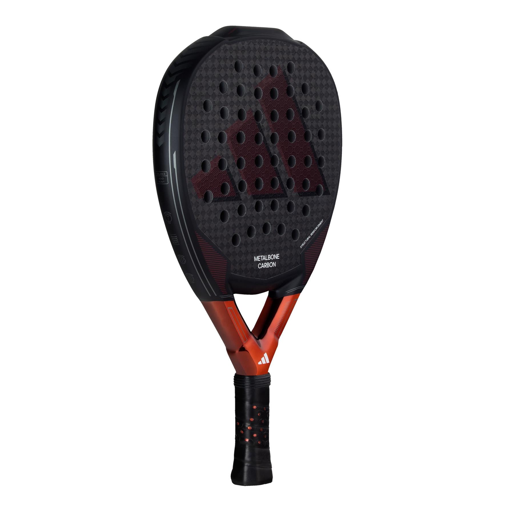 The adidas Metalbone Carbon 3.3 padel racket showcases a bold black and copper design with a perforated 6K carbon surface. It is equipped with a triangular bridge design and a textured grip handle, ideal for players seeking improved control on the court.