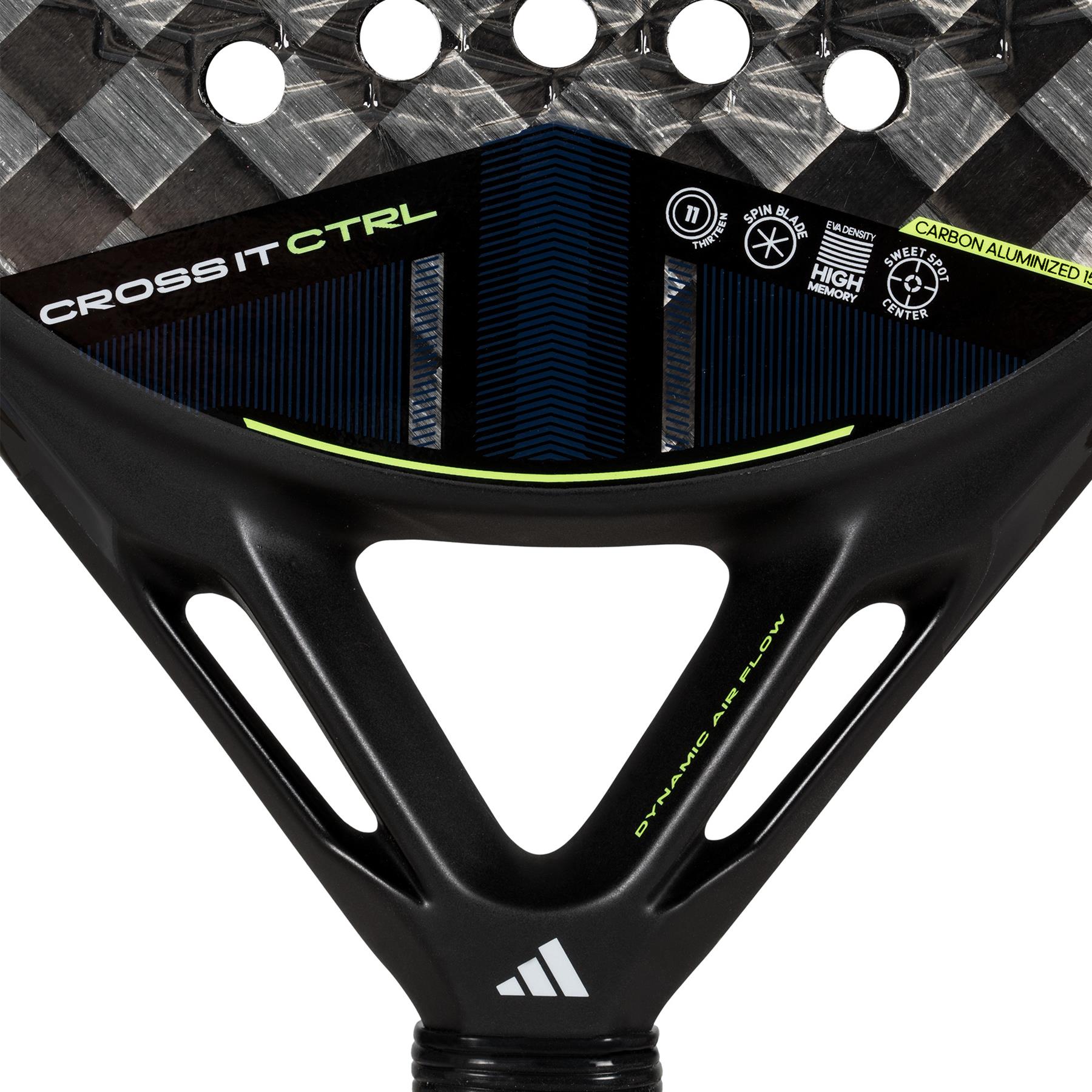 Close-up of the black and grey ADIDAS Cross It CTRL 3.4 Padel Racket for advanced players, showcasing texture with circular holes, green accents, "Carbon 15K," and "Dynamic Air Flow" logos for enhanced control.