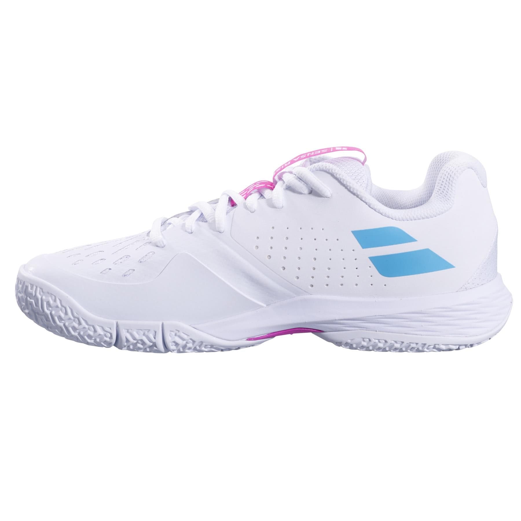 The Babolat Sensa Rise Womens Padel Shoes in White/Rhodamine Red feature a textured sole and stylish pink laces, shown in a side view on a plain white background—perfect for padel enthusiasts seeking comfort and performance.