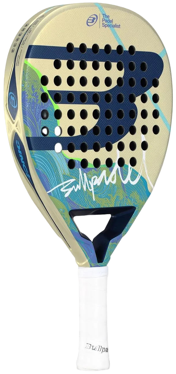 The Bullpadel Ionic Light 2026 Padel Racket by Bullpadel features a beige and blue design, large "B" logo, a signature, “The Padel Specialist” at the top, and a white grip tape on its lightweight handle.