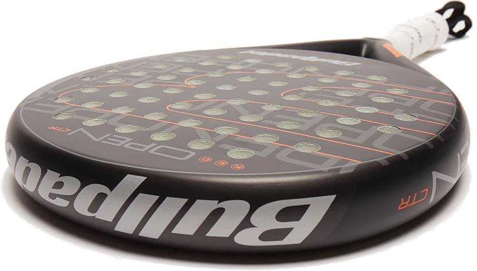 The Bullpadel Open Control 2025 Padel Racket by Bullpadel is designed for beginners, featuring a black design with orange accents, multiple circular holes on the surface, and a white overgrip-wrapped handle.