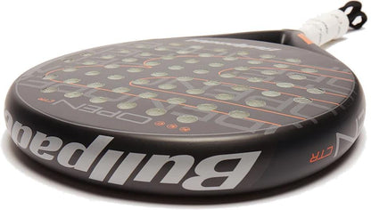 The Bullpadel Open Control 2025 Padel Racket by Bullpadel is designed for beginners, featuring a black design with orange accents, multiple circular holes on the surface, and a white overgrip-wrapped handle.