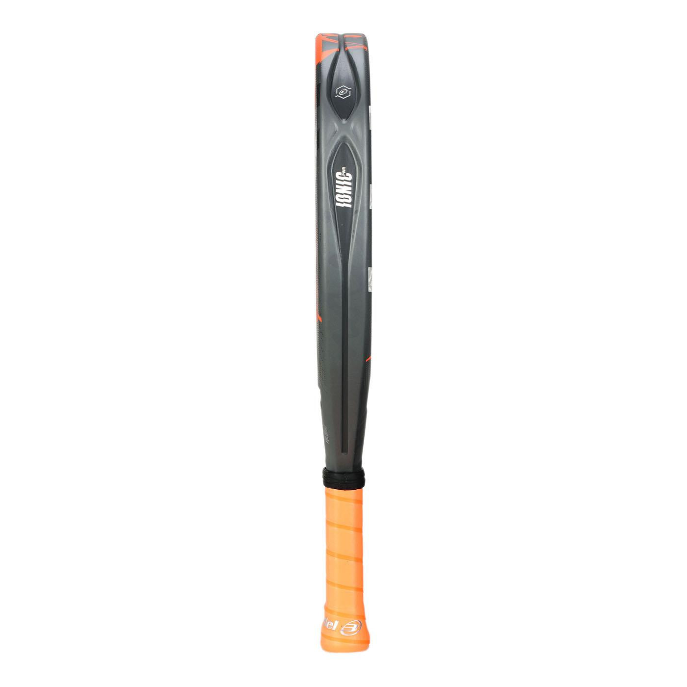 Side view of a sleek grey and orange Bullpadel Ionic Power 2025 padel racket. The frame features an engraved pattern, and the vibrant orange grip enhances performance, boasting IONIC POWER technology with a small Bullpadel logo visible.