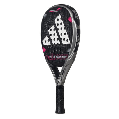 The ADIDAS Adipower Carbon Light 3.4 Padel Racket features a silver and pink design, accented by its large logo. Its Carbon 3K Fibre with 3D Spin Blade Mold provides precision and power. The surface has perforations, while the handle is wrapped in black grip tape for superior control.