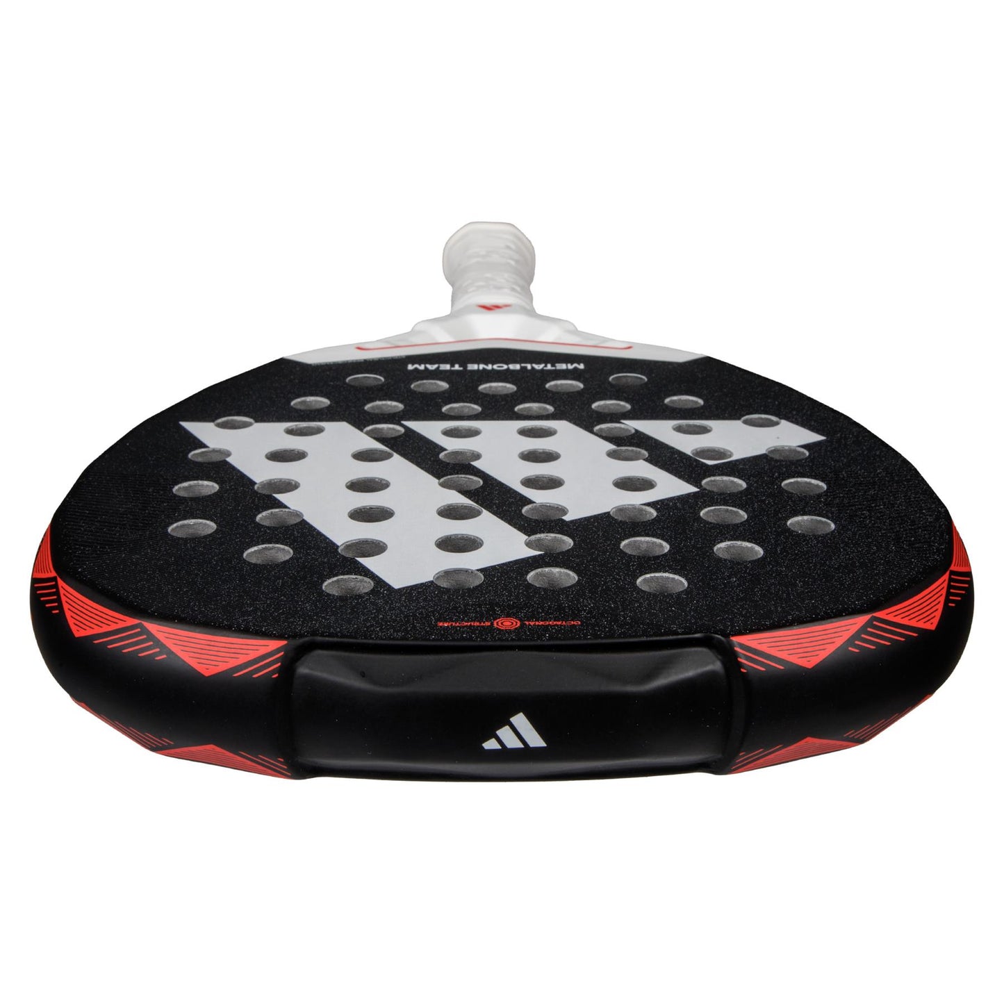 A close-up of an ADIDAS Metalbone Team 3.4 Padel Racket - Black/Red, featuring a textured surface and circular holes. Designed for advanced players, it boasts a white handle, geometric patterns, and the adidas logo in striking black and red tones.