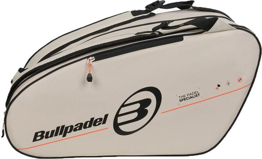 The Bullpadel BPP26015 Tour 2026 Padel Racket Bag in white features black zippers and straps, the Bullpadel logo on the side, spacious compartments for sports gear, and thermal sections to protect your padel rackets.
