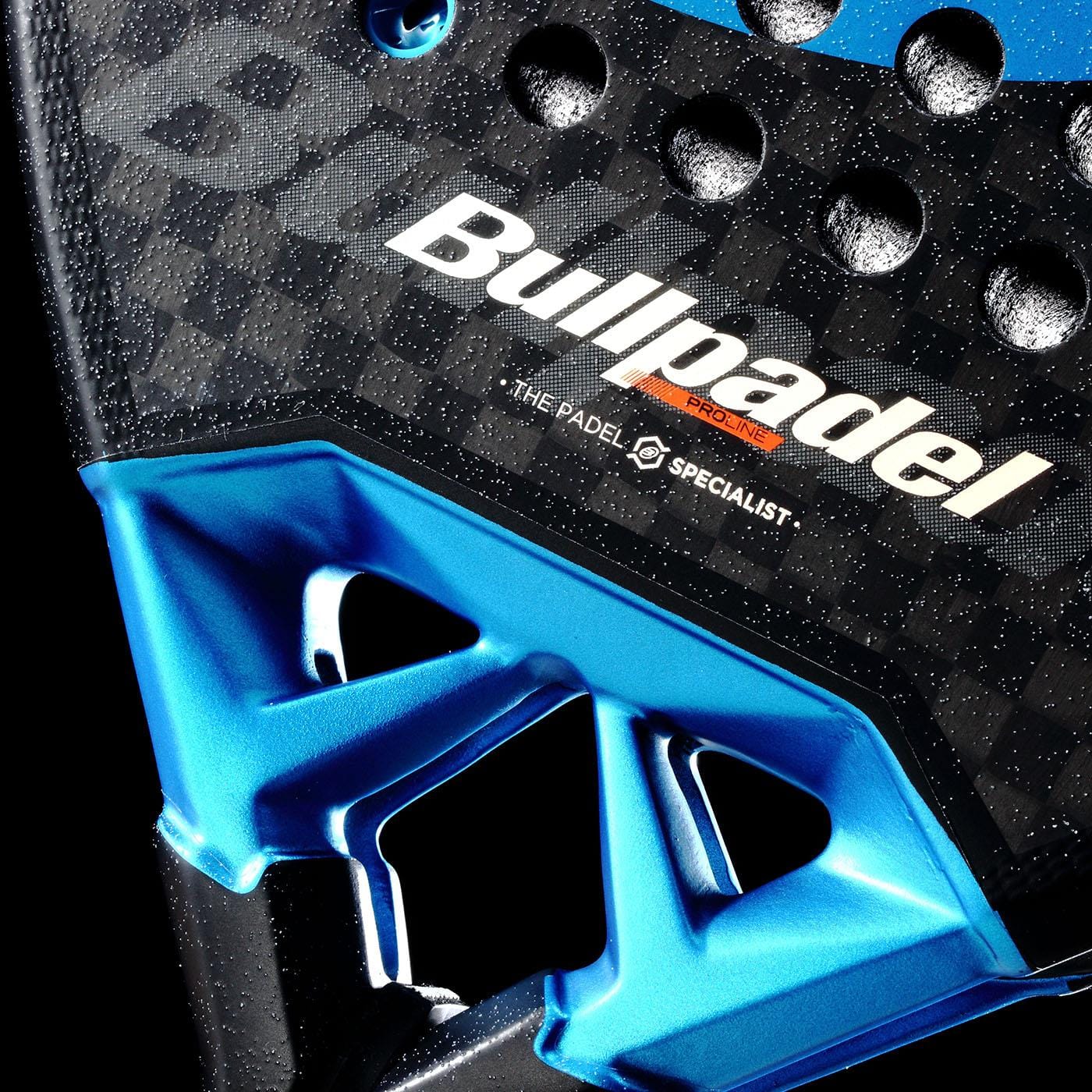 Close-up of the Bullpadel Vertex 05 Hybrid 2026 Padel Racket in black and blue, highlighting the Bullpadel branding, textured surface with circular holes, hybrid shape, and bold metallic blue detailing.