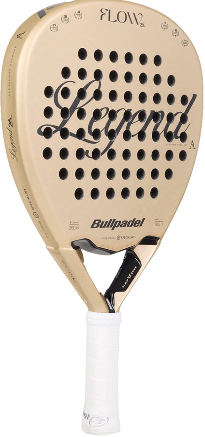 The Bullpadel Flow 2027 Padel Racket by Bullpadel features a gold diamond-shaped head with “Legend” inscribed in bold black script across the face, round perforations, a 3D Grain surface for improved spin, and a white grip handle.