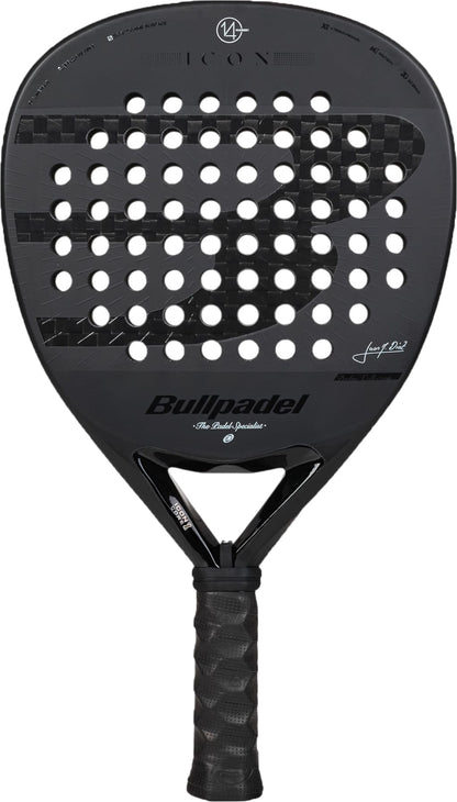 The Bullpadel Icon 2027 Padel Racket by Bullpadel features a sleek black design with a textured face, circular perforations, and a padded grip handle. It is constructed with advanced X-Tend Carbon 12K technology and includes a MultiEva core for superior performance. The front of the racket displays the “Bullpadel” brand name along with additional branding elements.