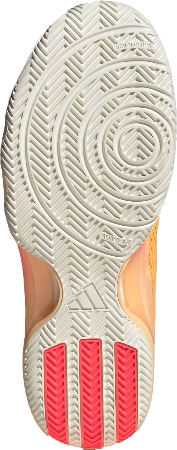 The image shows the sole of the adidas Crazyflight 7 Indoor Mens Padel Shoes in Lucid Tangerine/Lucid Orange/Off White, featuring an off-white sole with circular and zigzag tread, three red heel grips, and LightstrikePro cushioning.