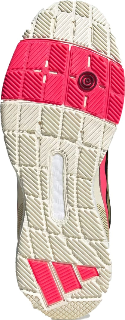 The image shows the sole of the ADIDAS Crazyquick Boost Mens Padel Shoes in Core Black/Gold Metallic/Solar Turbo, featuring a textured white rubber pattern with bright pink accents, a circular heel design for energy return, and a midfoot window.