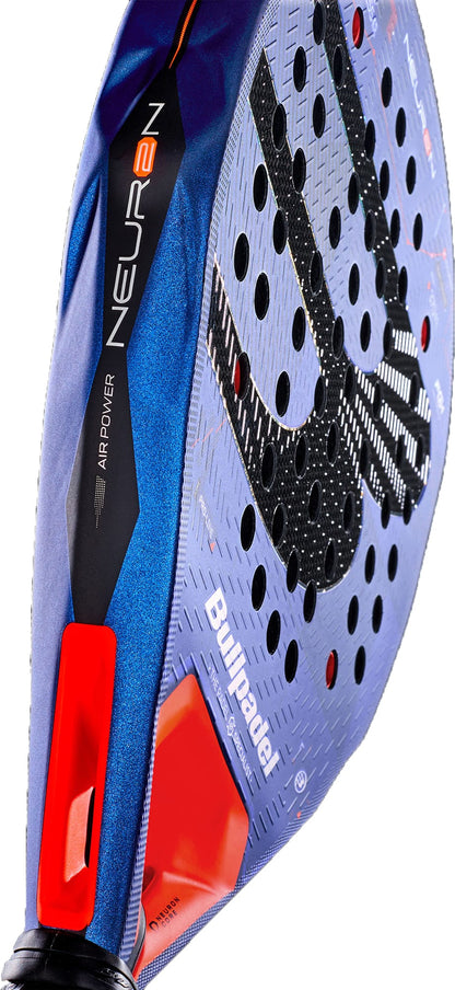 Close-up of the Bullpadel Neuron 2027 Padel Racket in blue, highlighted with black details, a textured surface, and distinctive orange and black accents on the handle. This racket from Bullpadel features advanced PrismLock technology and is constructed with a durable HardEva core for superior performance.