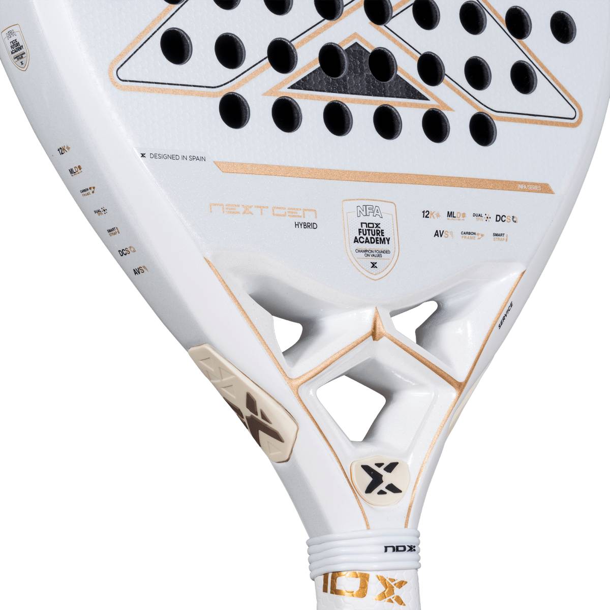 Close-up of the NOX NextGen Pro Hybrid 12K NFA 2026 padel racket: white hybrid shape, black holes, gold accents, "NEXTON HYBRID" and "Nox Future Academy" text. Made with durable 12K Carbon for performance; handle shows part of NOX logo.